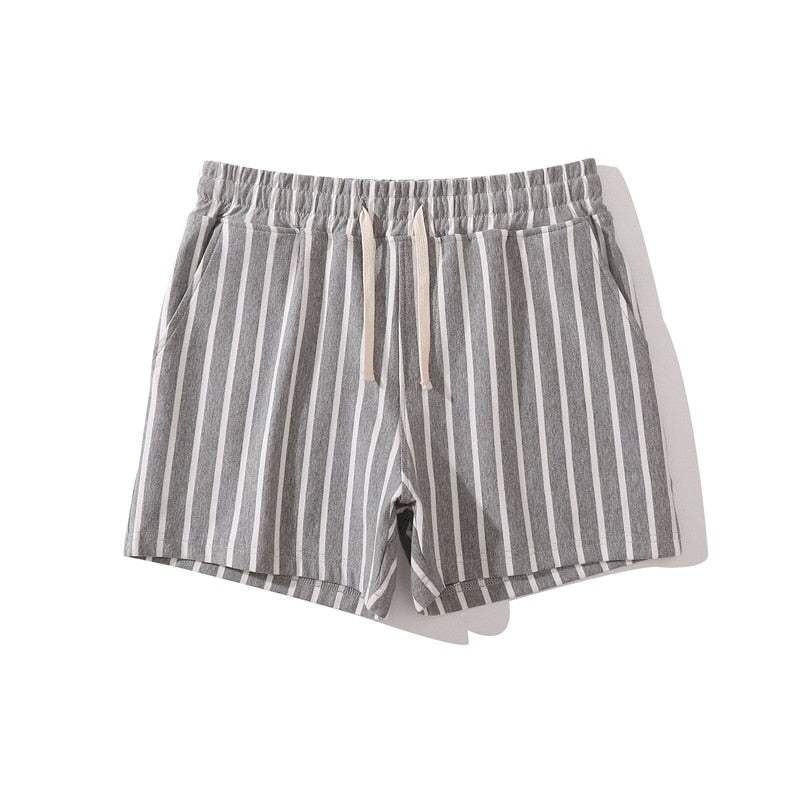 Gray slim-fit shorts with vertical white stripes, drawstring waist, and side pockets
