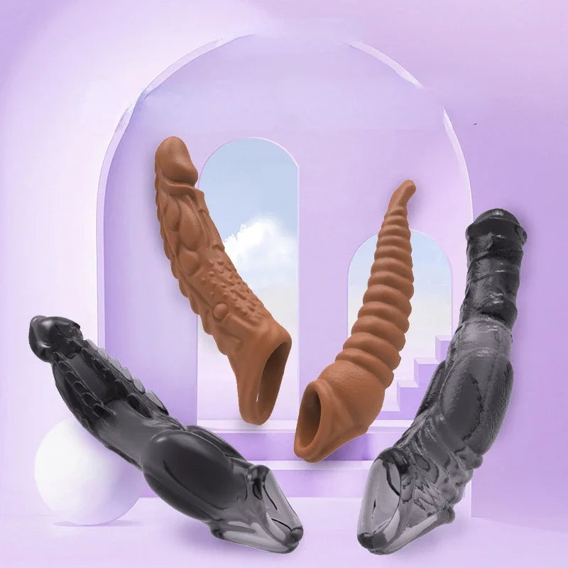 Four textured penis extension sleeves in black and brown, arranged on a purple set