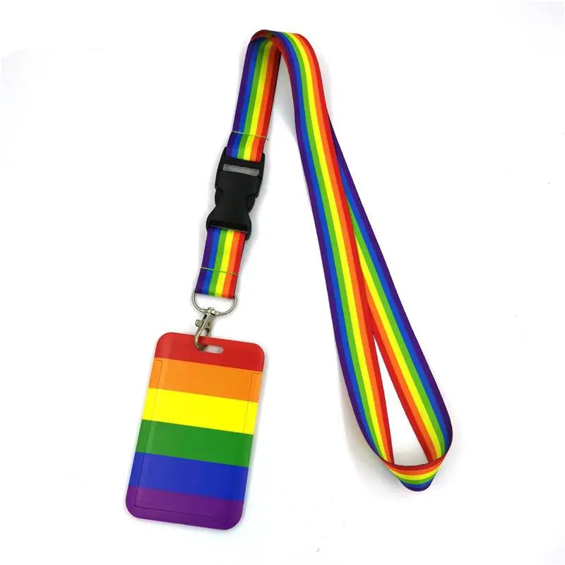 Rainbow-striped lanyard with black buckle and matching rainbow ID card holder