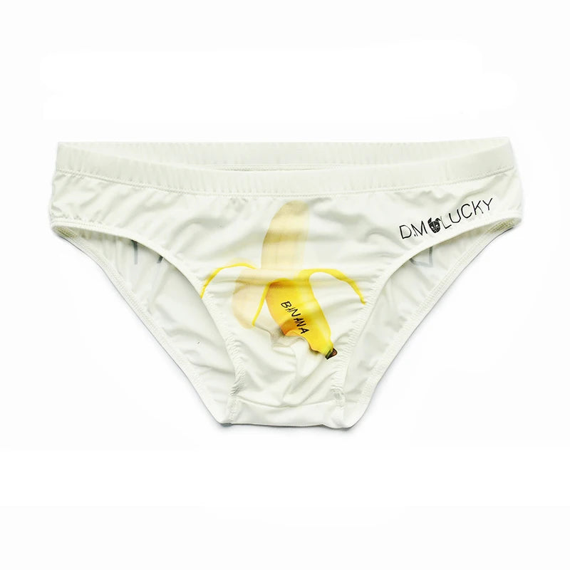 Front view of white briefs with a yellow banana print and D.M. LUCKY text