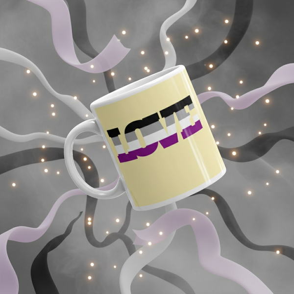 Asexual Love Mug featuring LOVE over asexual-pride stripes, floating amid vibrant streamers and sparkles. Celebrate LGBTQIA+ pride with this sturdy, glossy ceramic mug, perfect for expressing queer identity daily.