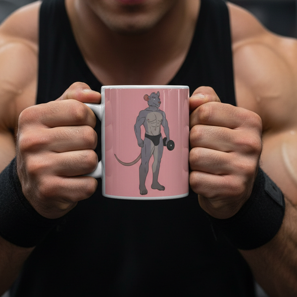 Person holding the Gay Gym Rat Mug, featuring a bold, muscular cartoon rat in black briefs with a dumbbell, symbolizing pride and strength. A fun, empowering design from Queer In The World.