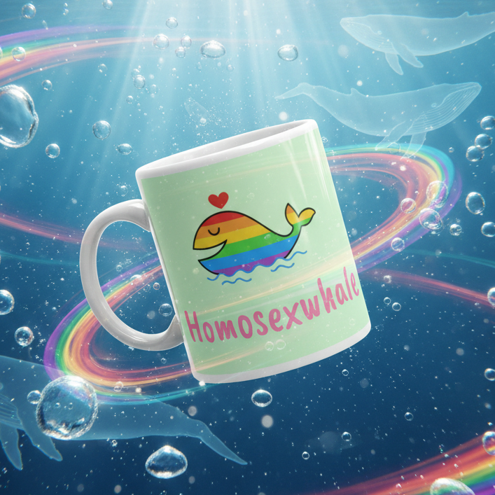 Homosexwhale Mug featuring a playful cartoon whale adorned with rainbow stripes and a heart, set in an underwater scene with bubbles and swirling rainbow trails, embodying vibrant LGBTQIA+ pride and self-expression.