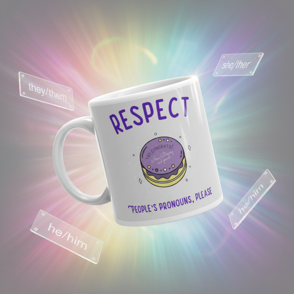 Angled white mug reading “RESPECT PEOPLE’S PRONOUNS, PLEASE,” with a purple frosted cake