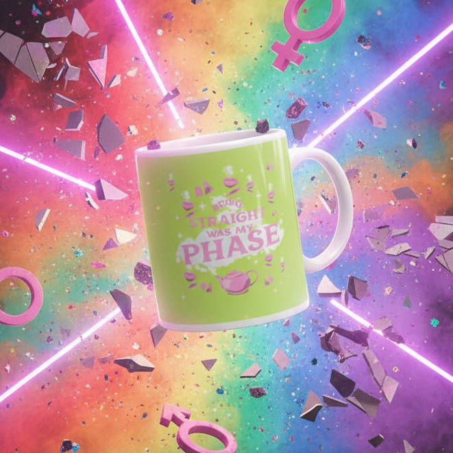 Being Straight Was My Phase Mug showcased amidst dynamic neon elements and gender symbols; a vibrant, sturdy ceramic piece celebrating queer pride, empowerment, and visibility. Perfect for joyful, expressive moments.