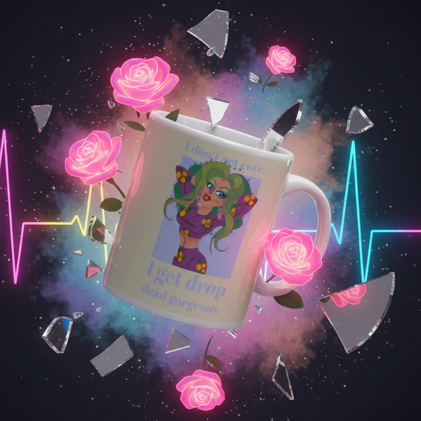 Drop Dead Gorgeous Mug featuring a green-haired woman in a purple floral outfit, set in a vibrant space-like scene with reflective shards, pink roses, and colored smoke, embodying bold LGBTQIA+ pride and empowerment.
