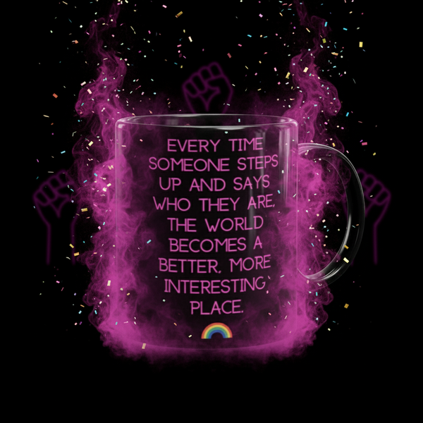 Clear glass mug with bold pink quote, Every Time Someone Stands Up... and rainbow icon. Surrounded by purple mist and confetti, it embodies queer empowerment and pride. Dishwasher and microwave safe.