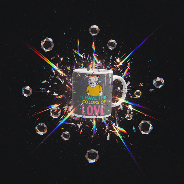 The I Have The Colors Of Love Mug features a cartoon tiger with a rainbow tear, embodying bold queer pride and self-expression, set against floating rainbow-lit glass shards—a vivid celebration of LGBTQIA+ identity.