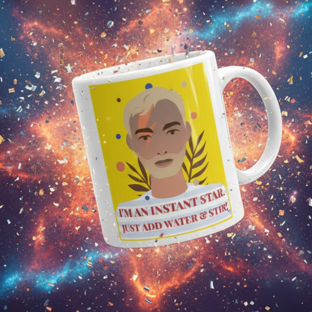I'm An Instant Star Mug with pop-art portrait and slogan, celebrating LGBTQIA+ pride. Sturdy, glossy, dishwasher, and microwave safe; perfect for coffee, tea, or wine. Bold, empowering queer design by Queer In The World.