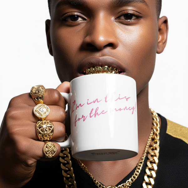 A person with bold gold jewelry sips from the I'm In This For The Money mug, showcasing its queer, empowering design with vibrant pink lettering, reflecting pride and self-expression.
