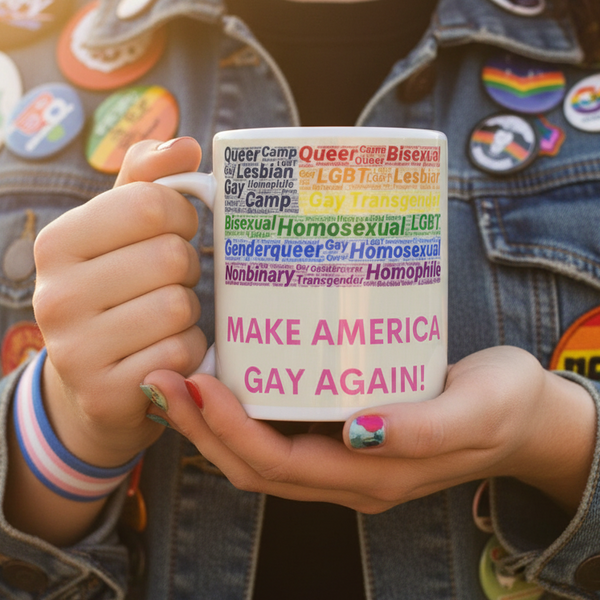 Hands hold the Make America Gay Again! mug, adorned with LGBTQ terms in rainbow hues, reflecting a vibrant, inclusive spirit. The person wears a denim jacket with pride-themed accessories, embodying joyful queer empowerment.