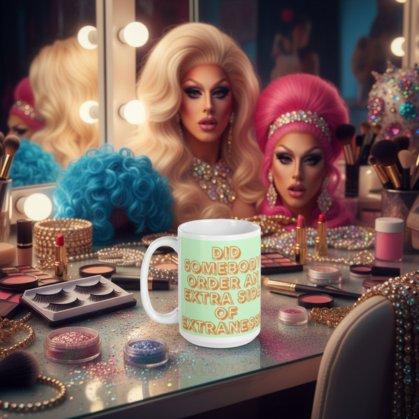 Extra Side Of Extraness Mug sits glamorously among vibrant makeup on a vanity, reflecting drag-queen heads in the mirror, embodying Queer In The World’s prideful, expressive, and bold queer spirit.
