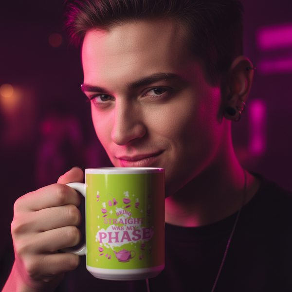 A young person with short hair smiles, holding a vibrant green Being Straight Was My Phase mug, adorned with tea icons, embodying Queer In The World's prideful, empowering spirit.