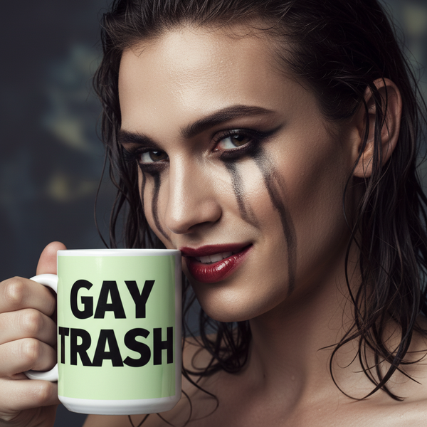 Person with wet, tousled hair and smeared makeup holds a GAY TRASH mug, embodying bold, queer self-expression. The Gay Trash (Black Text) Mug celebrates LGBTQIA+ pride with its sturdy, glossy ceramic design.