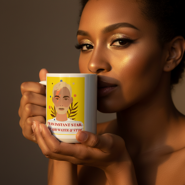 Close-up of a person with glowing skin and golden makeup holding the I'm An Instant Star Mug, featuring a vibrant illustration and slogan, embodying queer pride and self-expression with bold, joyful energy.