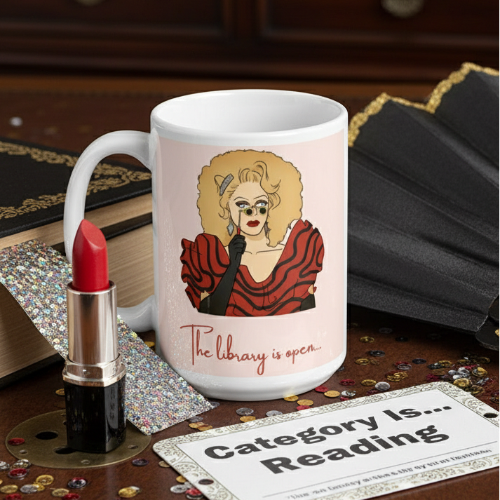 The Library Is Open (Rupaul) Mug features a vibrant portrait with a blonde wig and red dress, surrounded by confetti and a fan, embodying LGBTQIA+ pride and self-expression.