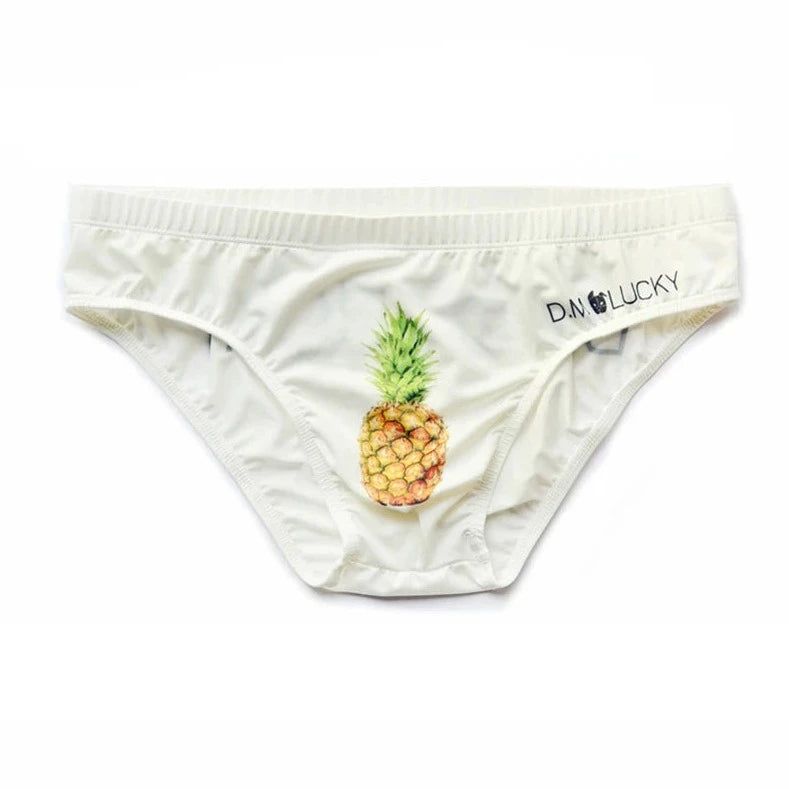 Front view of white men's briefs with a pineapple print and pouch front