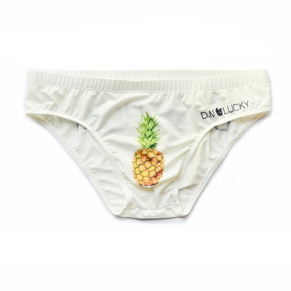 Front view of white men's brief underwear with a pineapple graphic and printed waistband text