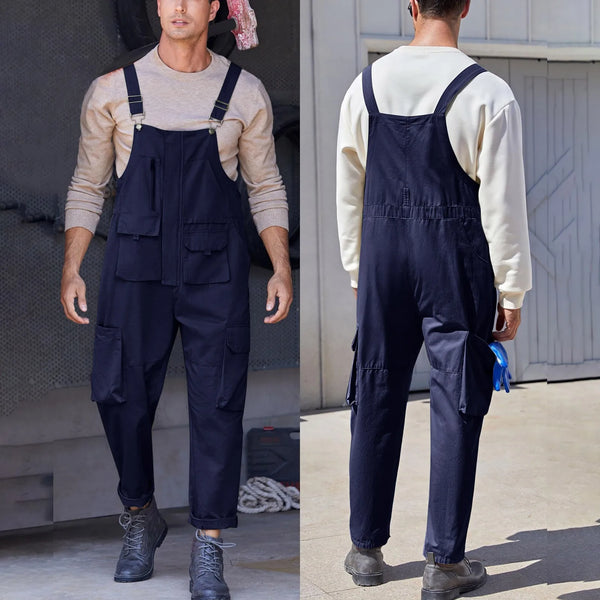 Front and back views of a model wearing navy utility bib overalls with multiple pockets