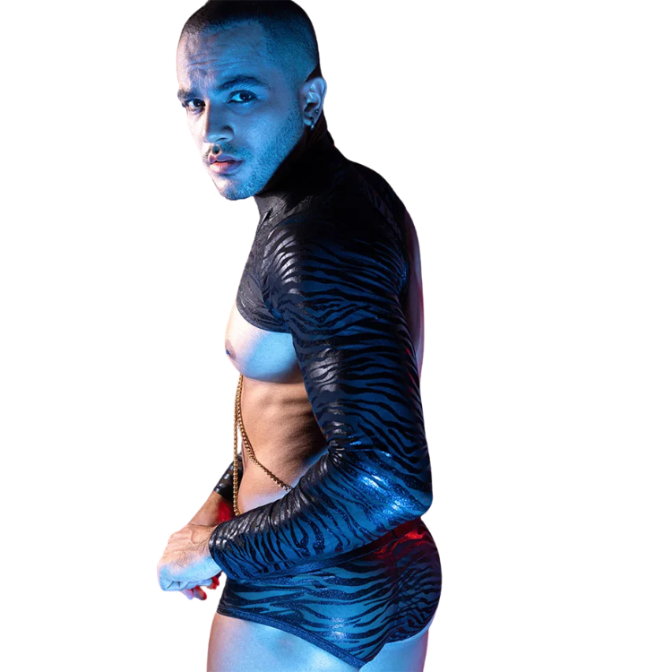 Side-view model wearing a black-and-blue zebra-print cutout bodysuit with a chain detail