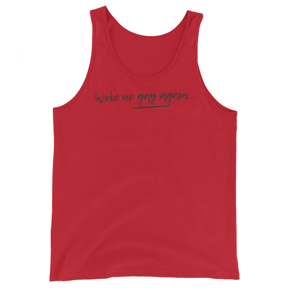 Front view of a red tank top reading “woke up gay again...” in dark script
