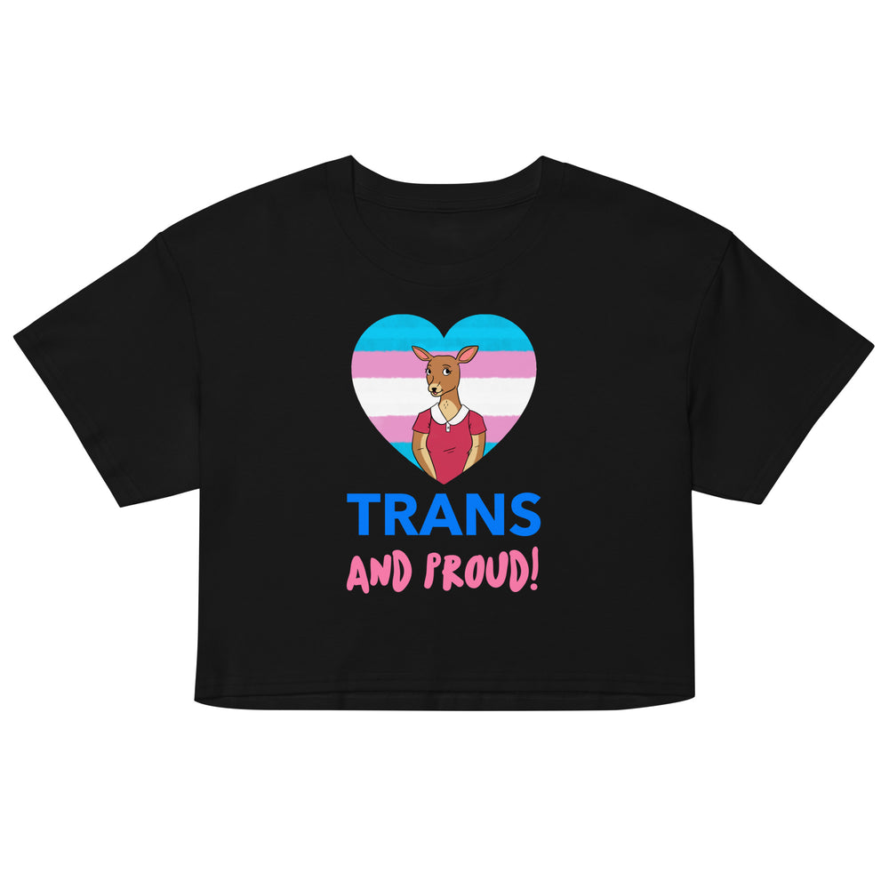Front view of a black crop top reading “TRANS AND PROUD!” with a heart graphic