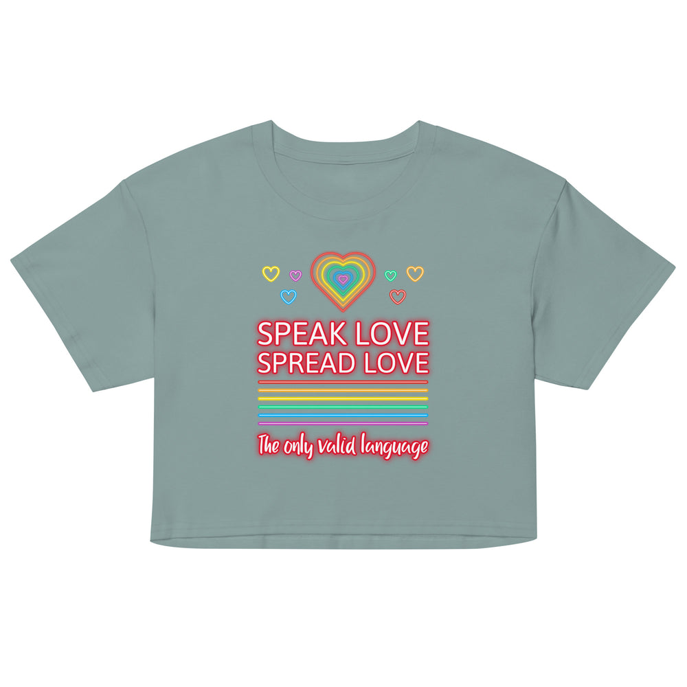 Front view of a sage-green crop top with rainbow hearts and “SPEAK LOVE SPREAD LOVE” text