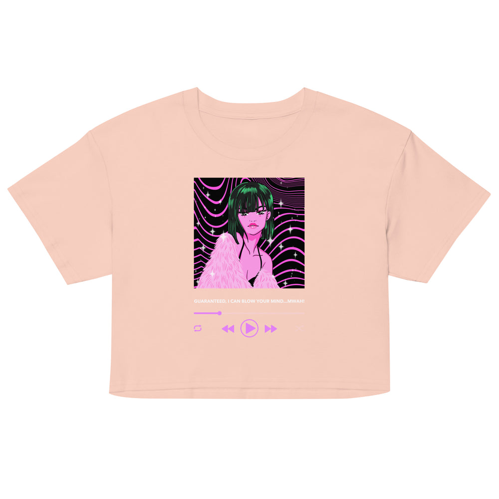 Front view of a peach crop top with a pink-haired woman graphic and music-player design