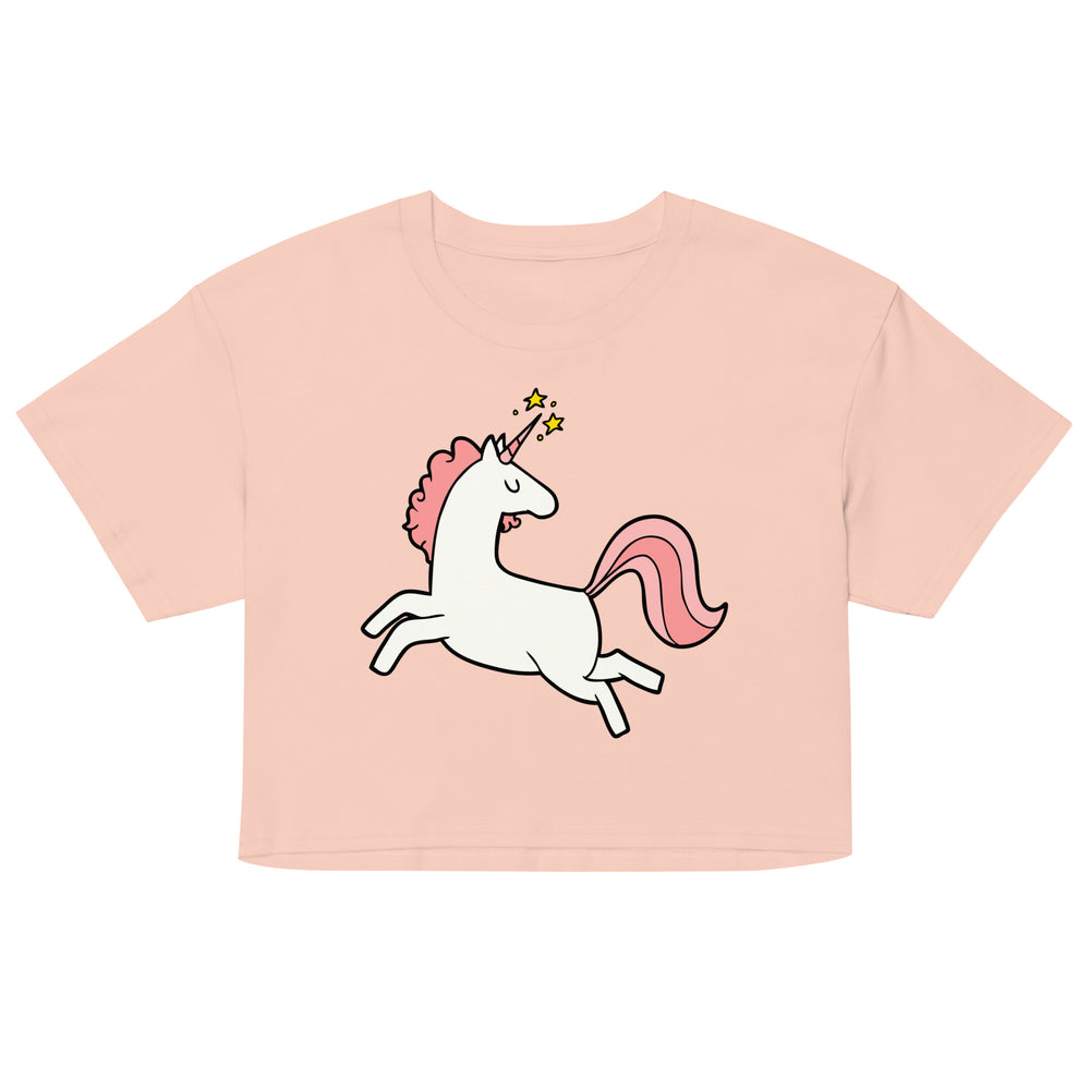 Front view of a pale pink crop top with a leaping white unicorn graphic and pink mane and tail