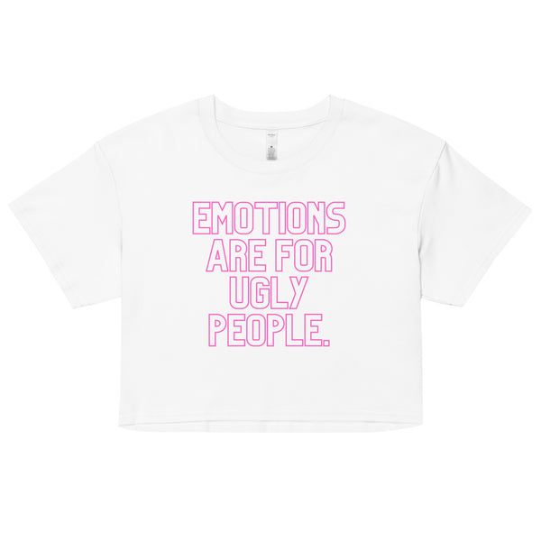 White cropped T-shirt with pink outlined text reading “EMOTIONS ARE FOR UGLY PEOPLE.”
