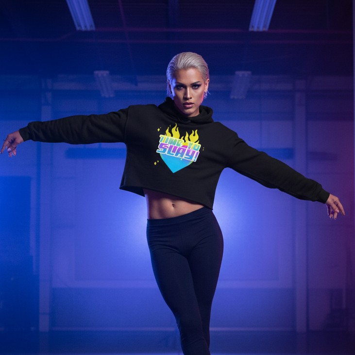 Time To Slay! Crop Hoodie with vibrant flame graphic, worn by a platinum-haired woman, queer fashion vibes, blue-purple lighting.