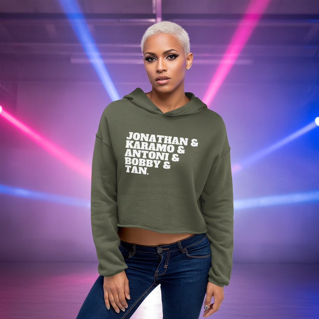 Crop hoodie in olive with “Jonathan & Karamo & Antoni & Bobby & Tan” text, worn by a confident queer person, platinum hair.