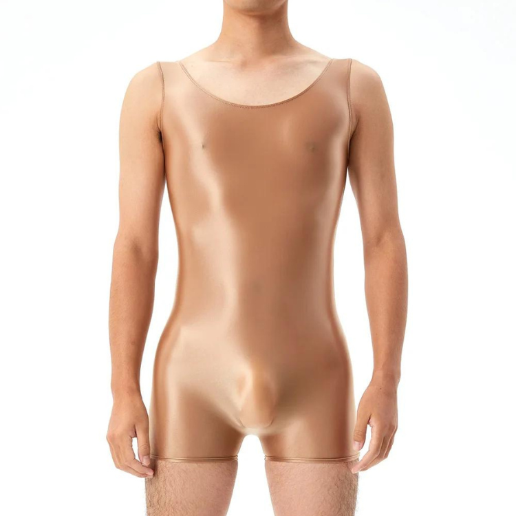 Front-view model wearing a shiny tan sleeveless wrestling bodysuit