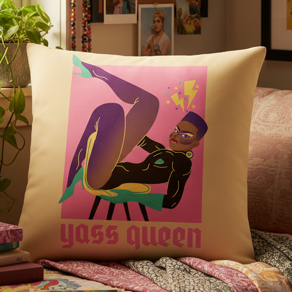 Yass Queen Pillow for queer decor features a bold, short-haired figure with dramatic makeup, lightning bolts