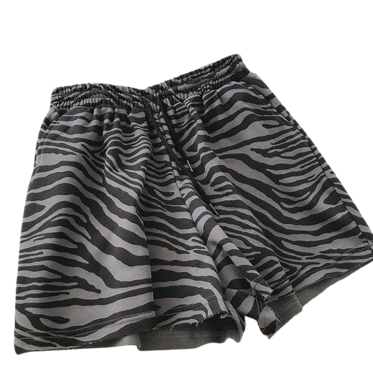 Gray-and-black zebra-print swim shorts shown at an angled front view