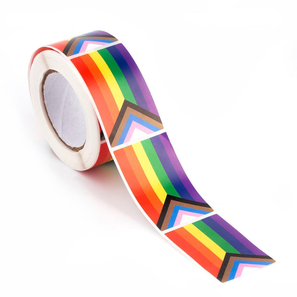 Roll of Progress Pride flag stickers, with several stickers peeling away on a white background
