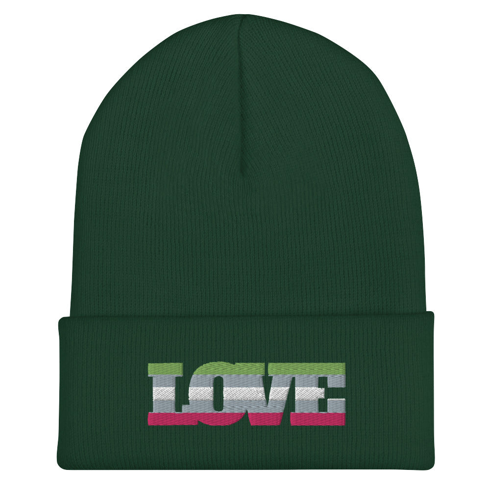 Front view of a dark green cuffed beanie with a striped abstract embroidered logo