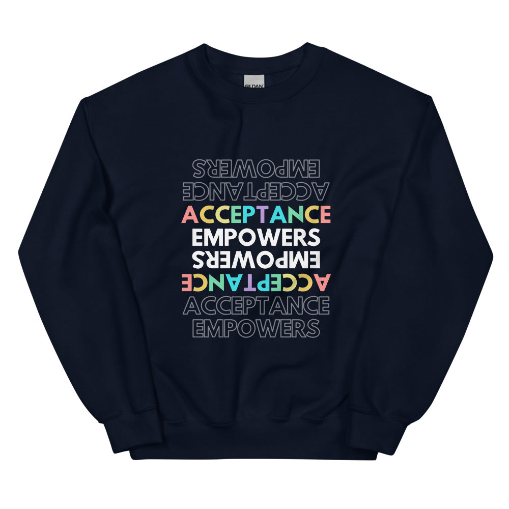 Navy crewneck sweatshirt with colorful “ACCEPTANCE EMPOWERS” text repeated upside down