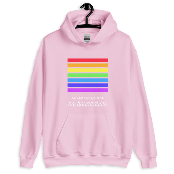 Front view of a pink hoodie with rainbow bars and “Acceptance Has no boundaries” text