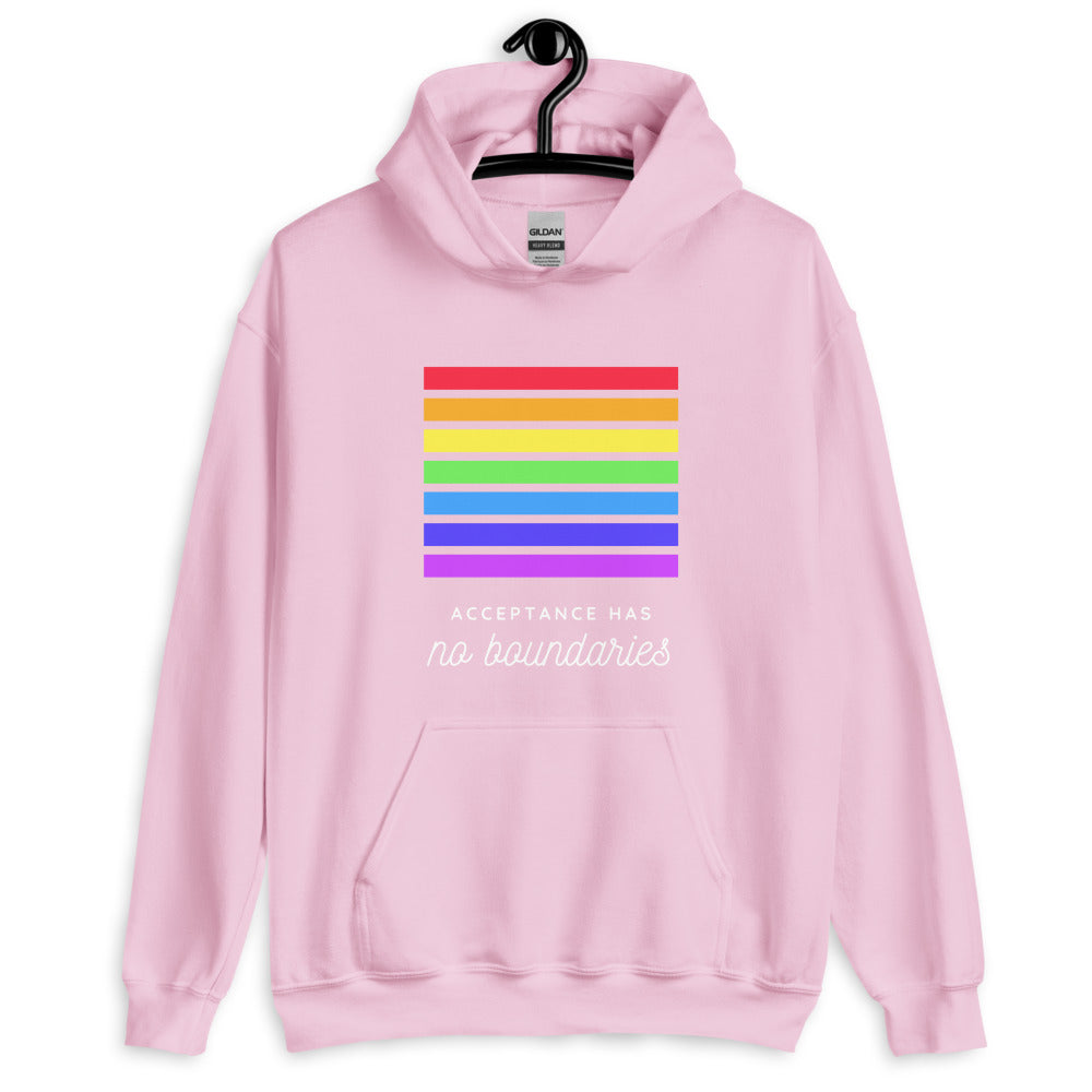 Front view of a pink hoodie with rainbow bars and “Acceptance Has no boundaries” text
