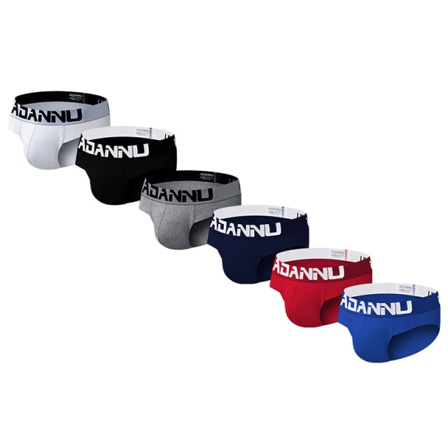 Six ADANNU classic briefs in white, black, gray, navy, red, and blue with branded waistbands