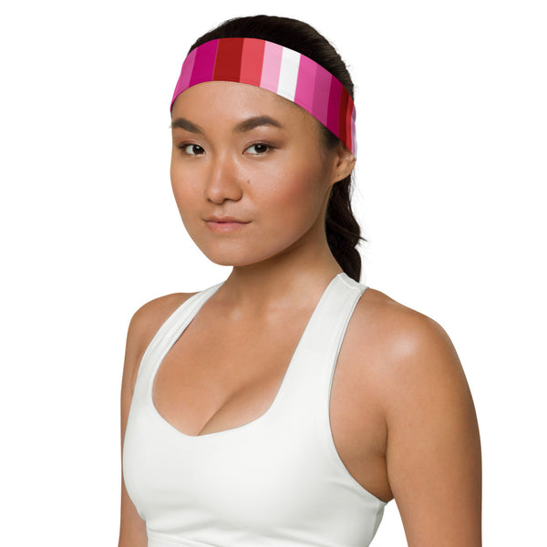 Model wearing a pink, red, and white striped lesbian Pride headband