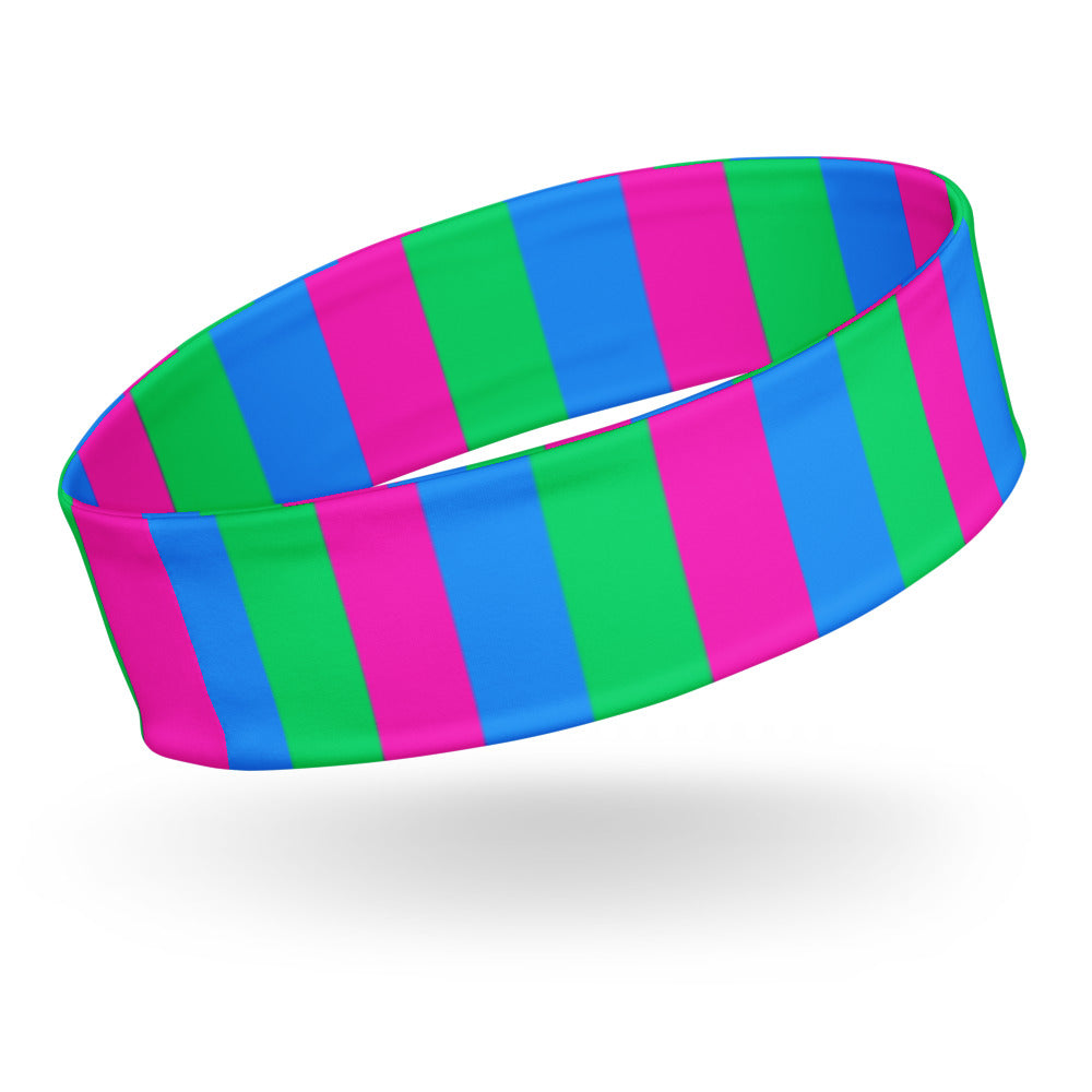 Wide headband with alternating bright pink, green, and blue vertical stripes, shown at an angle