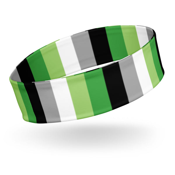 A green, black, white, and gray striped headband shown at an angled product view