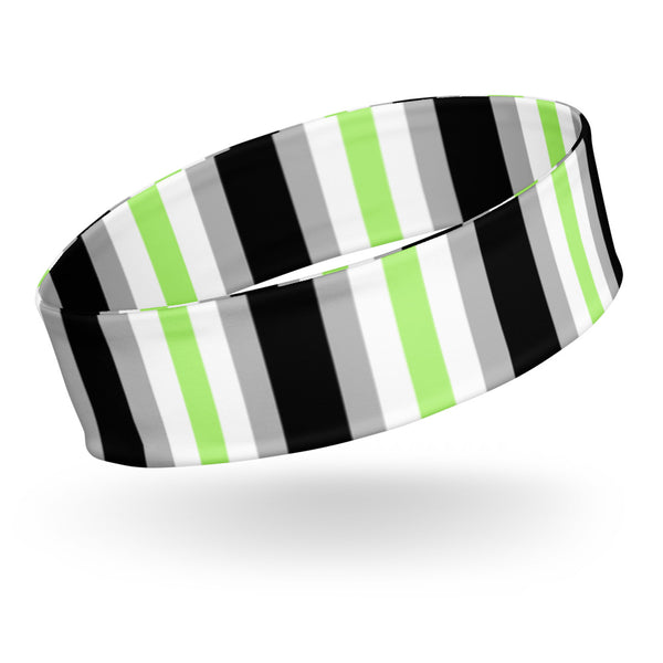 Angled product view of a wide headband with black, gray, white, and lime-green stripes