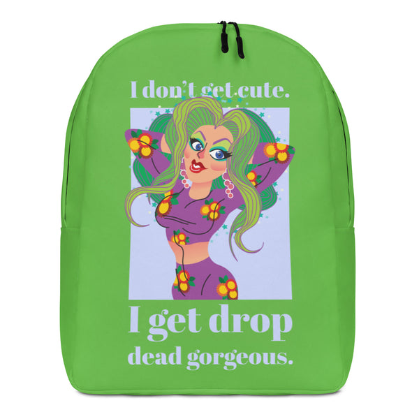 Front view of a bright green backpack reading “I don’t get cute. I get drop dead gorgeous.”