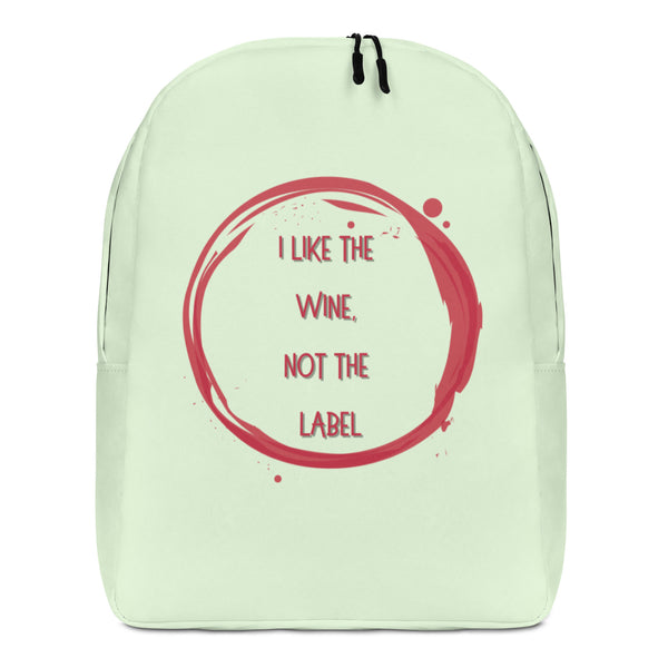 Front-facing pale green backpack with red circular text reading “I LIKE THE WINE, NOT THE LABEL”