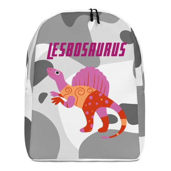 Front view of a gray-and-white patterned backpack reading “LESBOSAURUS,” with a colorful dinosaur graphic