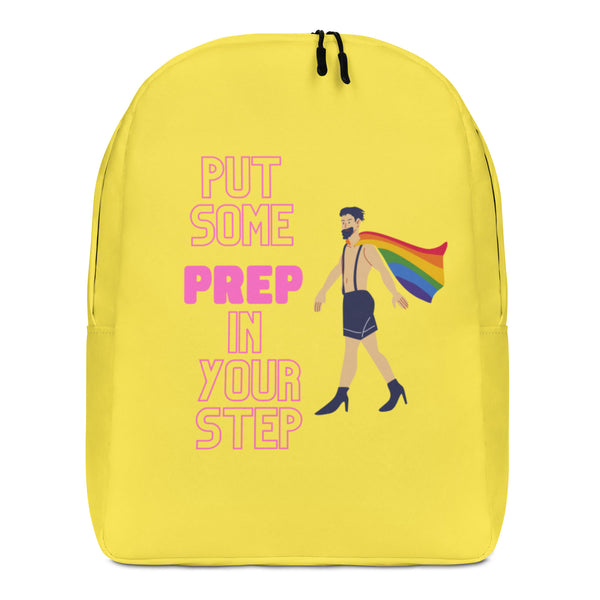 Front view of a yellow backpack reading “PUT SOME PREP IN YOUR STEP,” with a caped figure in heels