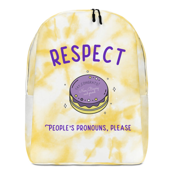 Front view of a yellow tie-dye backpack reading “RESPECT PEOPLE’S PRONOUNS, PLEASE”